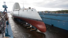 The ship is floated out of dry dock at the Bath Iron Works shipyard on October 28, 2013.