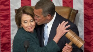 House Speaker John Boehner of Ohio, kisses House Minority Leader Nancy Pelosi of Calif. after being re-elected to a third term during the opening session of the 114th Congress, as Republicans assume full control for the first time in eight years, Tuesday, Jan. 6, 2015, on Capitol Hill in Washington. AP Photo/Pablo Martinez Monsivais )