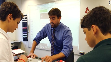 Students using standing desks to learn  - CNN.com