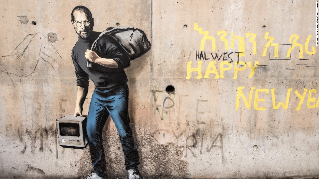 This image one, painted on a concrete bridge in December, depicts the late Steve Jobs, co-founder and CEO of Apple.