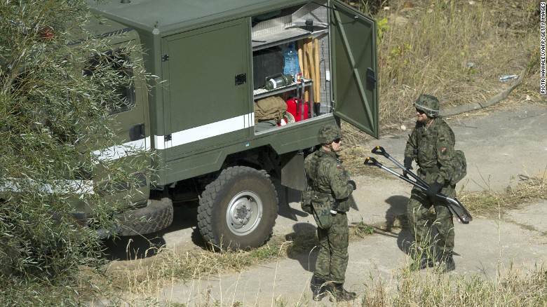 Soldiers prepare for the search near the railway tracks between Walbrzych and Wroclaw on September 28.