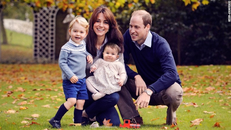 The Duke and Duchess of Cambridge are shown in their Christmas photo with their children, Prince George and Princess Charlotte.