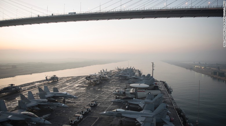 The aircraft carrier USS Harry S. Truman (CVN 75) passes under the Friendship Bridge while transiting the Suez Canal on Dec. 14, 2015. The movement of the Truman gives the U.S. Navy a carrier presence in the Mideast region for the first time since October. Missions for the Truman&#39;s air group could include strikes against ISIS. Click through the gallery to see other U.S. aircraft carriers.