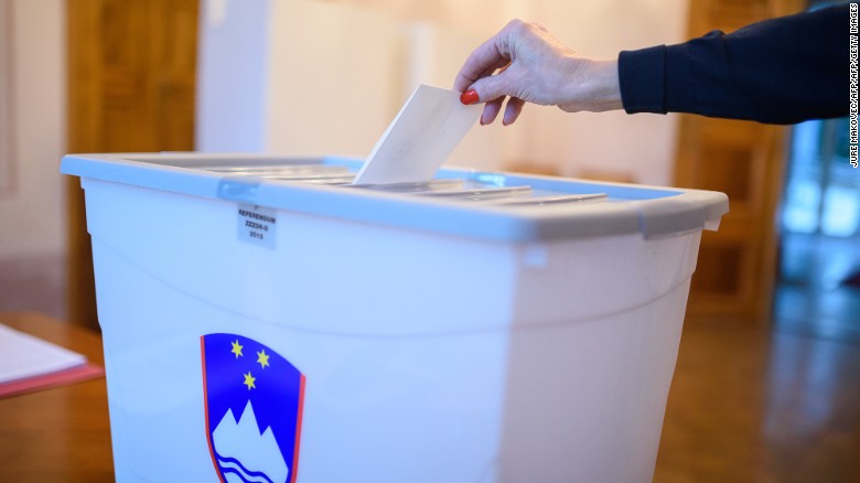 A Slovenian voter takes part in a referendum on legalizing same-sex marriage Sunday.