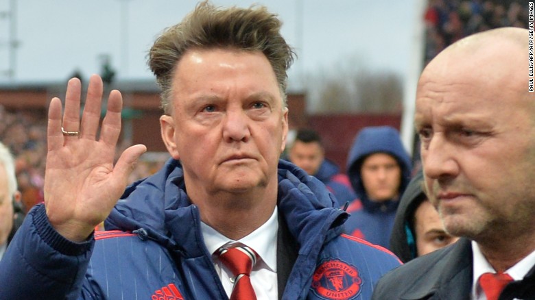 Manchester United manager Louis van Gaal waves as he leaves after Saturday&#39;s 2-0 defeat at Stoke. 
