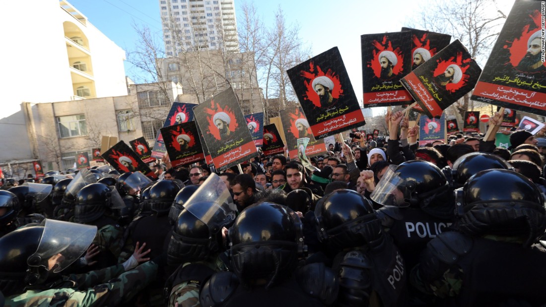 Iranian protesters hold portraits of prominent Shiite Muslim cleric Nimr al-Nimr as they confront riot police during a demonstration against his execution by Saudi authorities on Sunday, January 3, outside the Saudi embassy in Tehran, Iran. Saudi Foreign Minister Adel al-Jubeir told reporters that&lt;a href=&quot;http://www.cnn.com/2016/01/03/middleeast/saudi-arabia-executes-dozens-terror/index.html&quot; target=&quot;_blank&quot;&gt; Saudi Arabia is severing ties with Iran &lt;/a&gt;after an attack on the embassy.