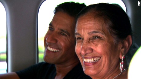 Dr. Sanjay Gupta and his mother, Damyanti, trace their ancestry for CNN's "Roots" series June 8, 2014 in Tharushah, Pakistan.