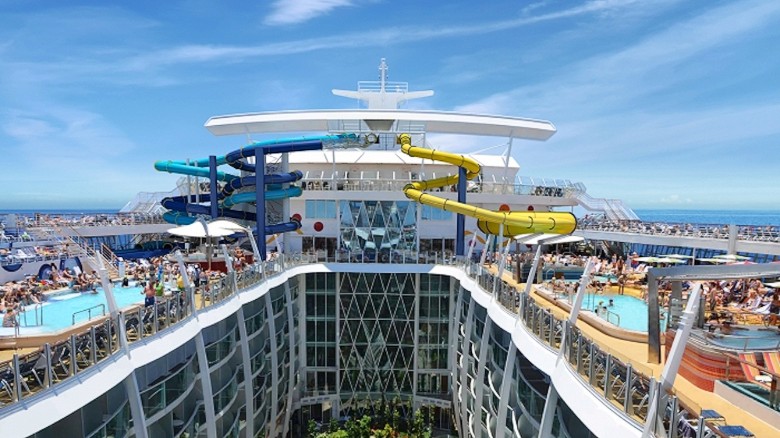 Stretching 1,187 feet, Royal Caribbean&#39;s Harmony of the Seas will soon be the largest ship sailing the globe. Along with towering water slides are water cannons, a drench bucket, multi-platform jungle gym, two climbing walls, a zip line and ice skating rink.  