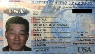 A copy of Kim Dong Chul&#39;s passport provided by North Korea.