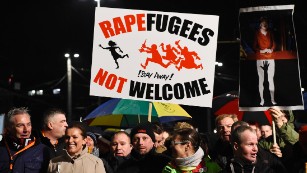 A sign read, &quot;Rapefugees not welcome.&quot;