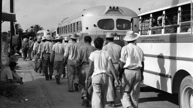 "Wetbacks," workers from Mexico board deportation buses at the McAllen, Texas, detention center, ca. early 1950s.