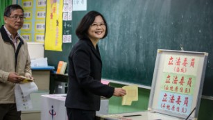 Taiwan’s first female president walks tightrope as she takes office