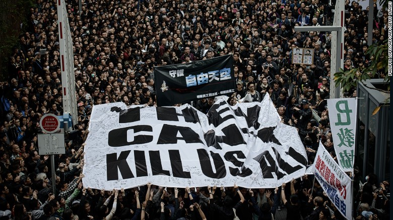 Protesters rally to support press freedom in Hong Kong.