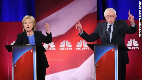 Democratic presidential candidates Hillary Clinton (L) and Senator Bernie Sanders (I-VT) participate in the Democratic Candidates Debate hosted by NBC News and YouTube on January 17, 2016 in Charleston, South Carolina.