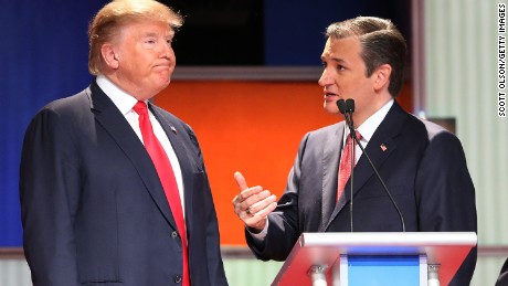 Republican presidential candidates (L-R) Donald Trump and Sen. Ted Cruz (R-TX) speak during a commercial break in the Fox Business Network Republican presidential debate at the North Charleston Coliseum and Performing Arts Center on January 14, 2016 in North Charleston, South Carolina. 