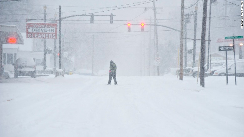 A person walks through the blowing snow in Bowling Green on January 22.