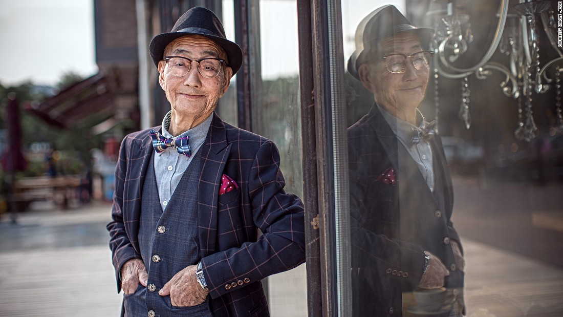 A photo series of Ding, nattily dressed and striking elegant poses, taken by his fashion photographer grandson recently went viral Chinese social media.