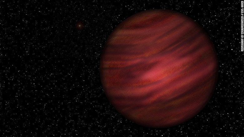 An artist&#39;s impression of 2MASS J2126, which takens 900,000 years to orbit its star, 1 trillion kilometers away. 