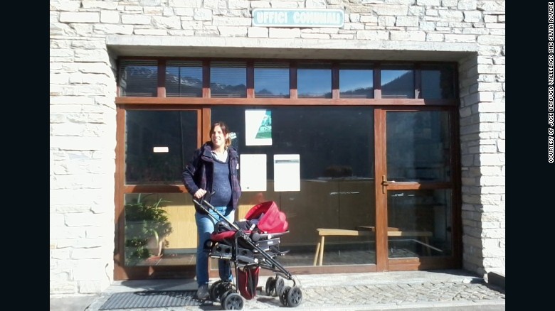 Silvia Rovere about to register her son Pablo at local registry office