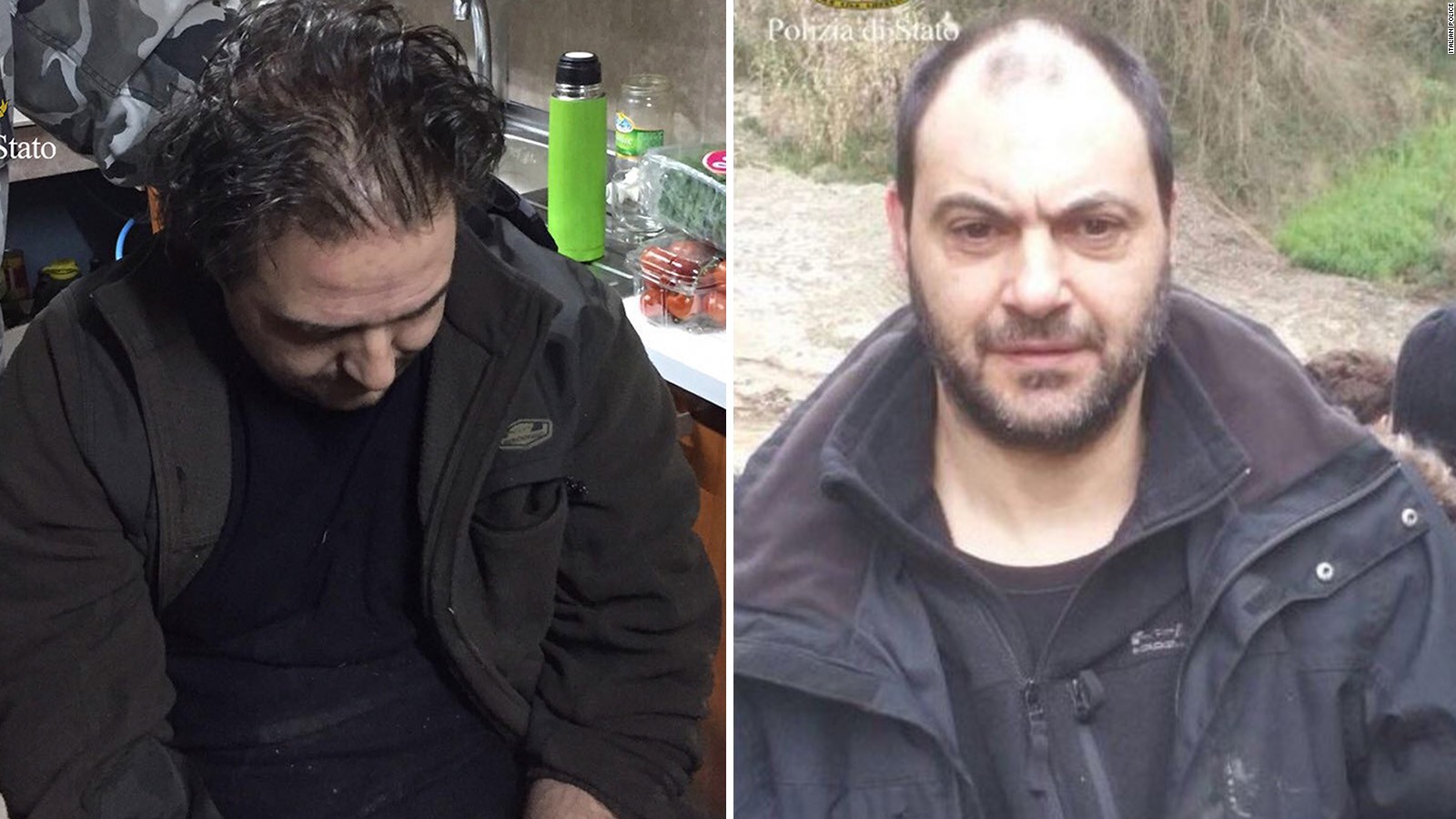 In photos released by the Italian Police, Giuseppe Crea, left, and Giuseppe Ferraro are seen after they were arrested. Italian police discovered an underground bunker in the countryside of southern Calabria Friday with the two mobsters, considered among Italy's most dangerous fugitives, holed up and sleeping inside.