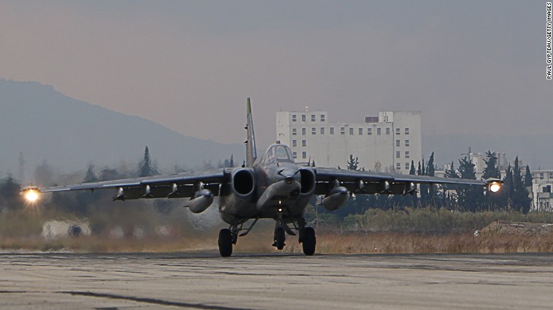 A Russian Sukhoi Su-34 bomber lands at the Russian Hmeimim military base in Latakia province, in the northwest of Syria, on December 16, 2015.