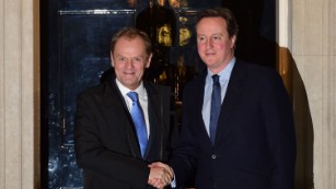 British Prime Minister David Cameron, greets European Council President Donald Tusk outside 10 Downing Street, London.