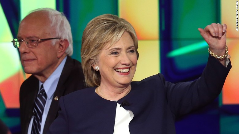 LAS VEGAS, NV - OCTOBER 13:  Democratic presidential candidates Sen. Bernie Sanders (I-VT) (L) and Hillary Clinton walk on the stage at the end of a presidential debate sponsored by CNN and Facebook at Wynn Las Vegas on October 13, 2015 in Las Vegas, Nevada. Five Democratic presidential candidates are participating in the party&#39;s first presidential debate.  (Photo by Joe Raedle/Getty Images)