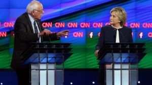 LAS VEGAS, NV - OCTOBER 13:  Democratic presidential candidates Sen. Bernie Sanders (I-VT) (L) and Hillary Clinton take part in a presidential debate sponsored by CNN and Facebook at Wynn Las Vegas on October 13, 2015 in Las Vegas, Nevada. Five Democratic presidential candidates are participating in the party's first presidential debate.  (Photo by Joe Raedle/Getty Images)