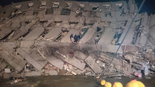 Rescuers scour rubble for survivors after earthquake kills 37 in Taiwan