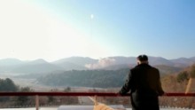 North Korean leader Kim Jong Un looked on as the rocket blasted off.