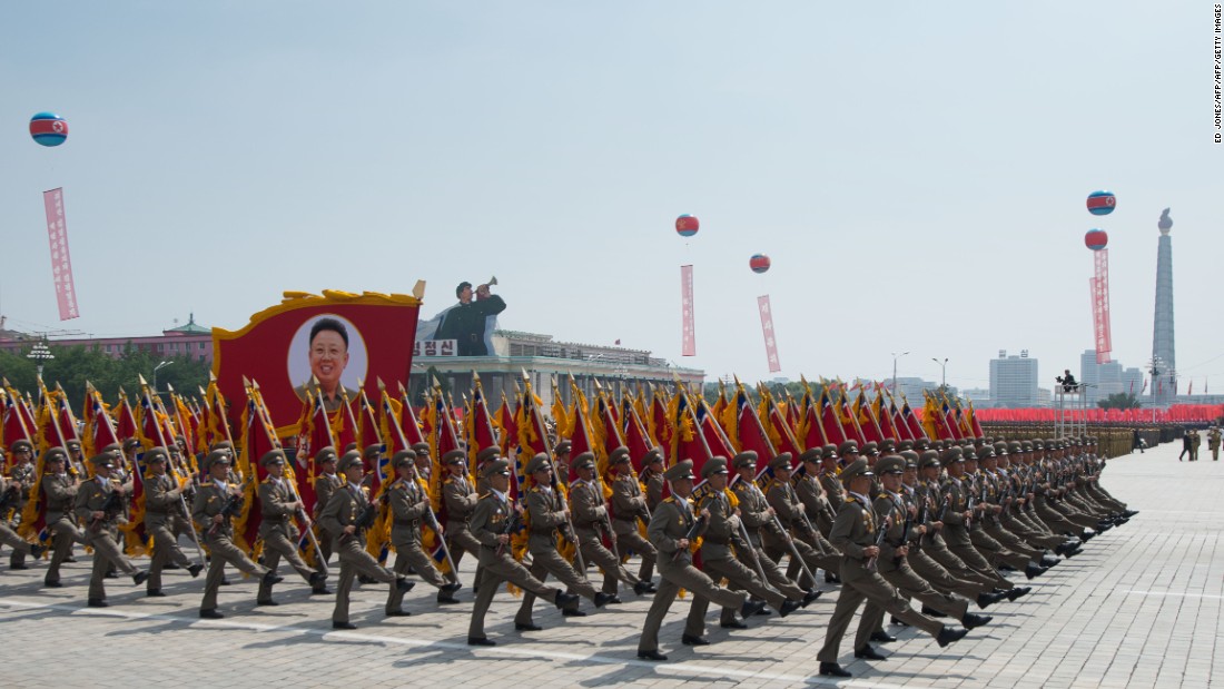 In a photo taken on July 27, 2013 North Korean soldiers march on Kim Il-Sung square during a military parade marking the 60th anniversary of the Korean war armistice in Pyongyang. North Korea mounted its largest ever military parade July 27 to mark the 60th anniversary of the armistice that ended fighting in the Korean War, displaying its long-range missiles at a ceremony presided over by leader Kim Jong-Un. AFP PHOTO / Ed Jones (Photo credit should read Ed Jones/AFP/Getty Images)