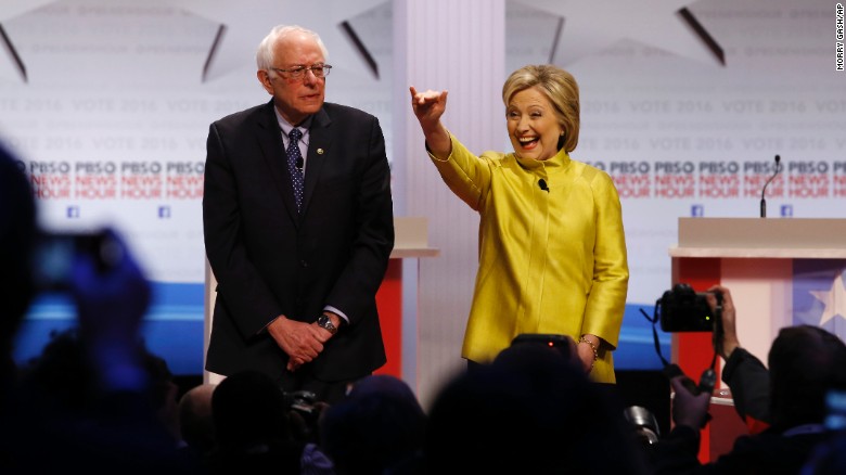 Democratic presidential candidates Sen. Bernie Sanders, I-Vt, left, and Hillary Rodham Clinton take the stage before a Democratic presidential primary debate at the University of Wisconsin-Milwaukee, Thursday, Feb. 11, 2016, in Milwaukee. (AP Photo/Morry Gash)