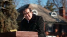 Scalia speaks to a crowd gathered at the Religious Freedom Monument in Fredericksburg, Virginia, to celebrate Religious Freedom Day on January 12, 2003. Scalia complained that courts have gone overboard in keeping God out of government.
