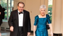 Scalia and his wife, Maureen, arrive for a state dinner in honor of British Prime Minister David Cameron at the White House on March 14, 2012, in Washington.