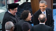 U.S. President Barack Obama greets Supreme Court Justices Clarence Thomas, Antonin Scalia, Sonia Sotomayor, Anthony Kennedy and John Roberts at Obama's inauguration for his second term of office.