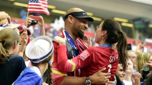 Ex-NFL player Jerramy Stevens congratulates his wife, soccer star Hope Solo, last year.
