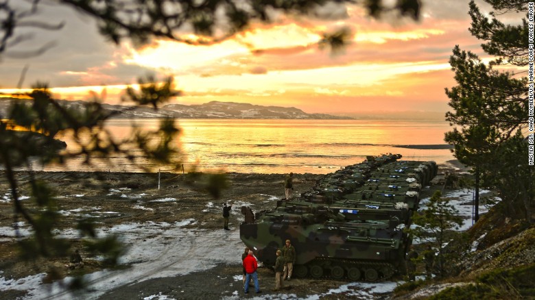 U.S. Marine Corps amphibious assault vehicles assemble before a public &quot;splash&quot; demonstration in the Trondheim Fjord in Norway in January.