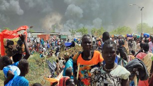 Clashes sent large plumes of smoke rising from burning tents in the camp.