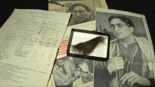 A lock of John Lennon&#39;s hair sold Saturday for $35,000. Included were two vintage newspapers and a signed call sheet.