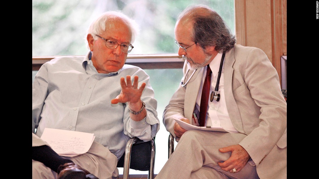 Sanders chats with Dr. John Matthew, director of The Health Center in Plainfield, Vermont, in May 2007. Sanders was in Plainfield to celebrate a new source of federal funding for The Health Center.