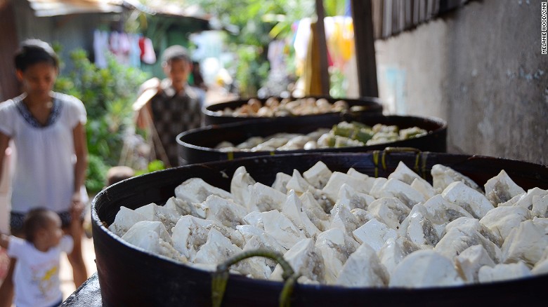 Siomay is a traditional steamed fish dumpling known in China as shaomi. It comes with a steamed potato, cabbage, egg and bitter gourd, served together with a boiled peanut sauce.