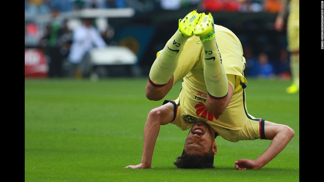 Club America's Oribe Peralta falls down Saturday, February 20, during a league match against Cruz Azul in Mexico City.