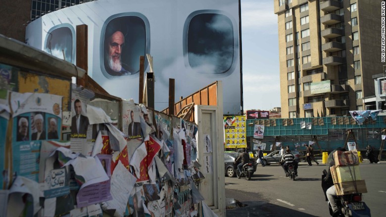 A picture of Iran&#39;s first supreme leader,  Ayatollah Ruhollah Khomeini, lurks behind campaign posters in Tehran. Iran is holding elections on Friday, February 26. For the first time, Iranians will vote to elect &lt;a href=&quot;http://www.cnn.com/2016/01/22/middleeast/iran-elections/&quot; target=&quot;_blank&quot;&gt;two important government bodies&lt;/a&gt; at the same time: the parliament and the Assembly of Experts. The Assembly of Experts chooses the supreme leader.