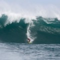 WAIMEA, HI - FEBRUARY 25:  Professional surfer John John Florence makes the drop in a wave at Waimea Bay on February 25, 2016 in Waimea, Hawaii.  (Photo by Darryl Oumi/Getty Images)