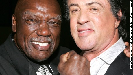LOS ANGELES, CA - DECEMBER 13:  Actors Tony Burton and Sylvester Stallone pose at the premiere of MGM's "Rocky Balboa"  after party held at the Hollywood and Highland Ballroom, on December 13, 2006 in Hollywood, California.  (Photo by Frazer Harrison/Getty Images)