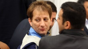  Babak Zanjani is seen, center, in court in a photo released on Sunday, March  The 41-year-old Iranian billionaire was convicted of fraud and economic crimes and is facing the death penalty. 