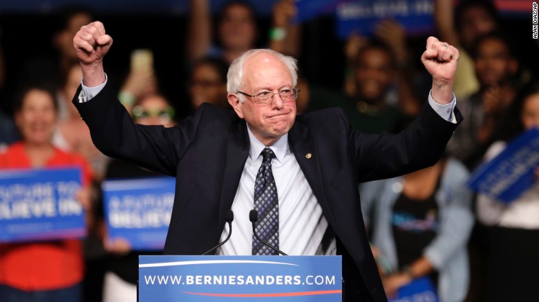 Democratic presidential candidate, Sen. Bernie Sanders, I-Vt. acknowledges his supporters on arrival at a campaign rally, Tuesday, March 8, 2016, in Miami. (AP Photo/Alan Diaz)