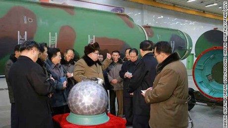 North Korean state media released photographs that it claims shows Kim Jong Un inspecting a miniaturized warhead. CNN cannot independently confirm the images.