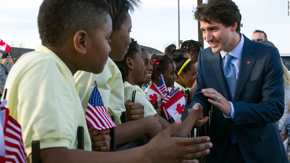 Trudeau greets students from Washington's Patterson Elementary School after he arrived at Andrews Air Force Base in Maryland on Wednesday, March 9.