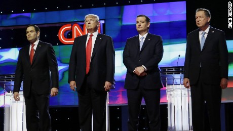 Republican presidential candidates, Sen. Marco Rubio, R-Fla., left, Donald Trump, Sen. Ted Cruz, R-Texas, and Ohio Gov. John Kasich, right, stand together before the start of the Republican presidential debate sponsored by CNN, Salem Media Group and the Washington Times at the University of Miami, Thursday, March 10, 2016, in Coral Gables, Fla. [AP Photo/Alan Diaz)